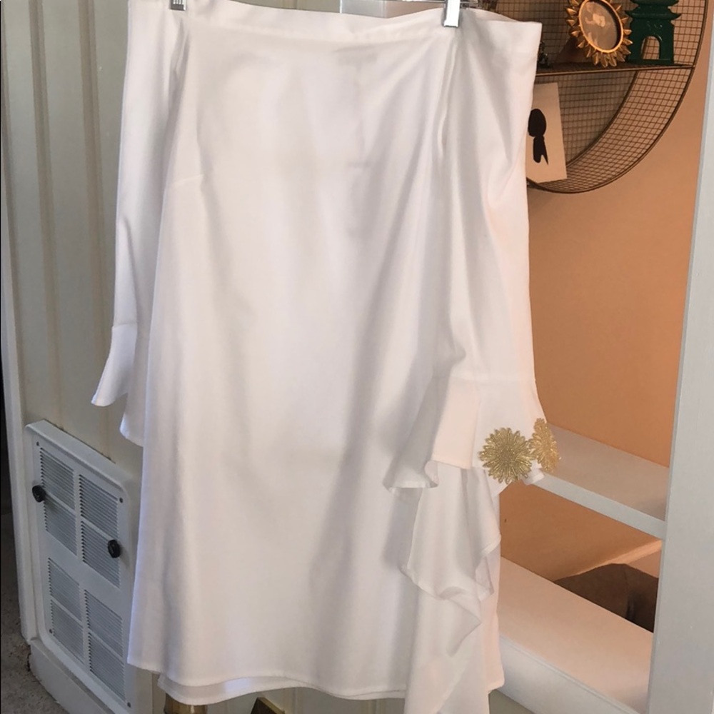 White off the shoulder dress with bell sleeves